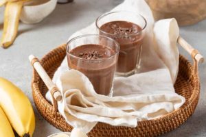 high-angle-chocolate-smoothie-with-bananas-min-1